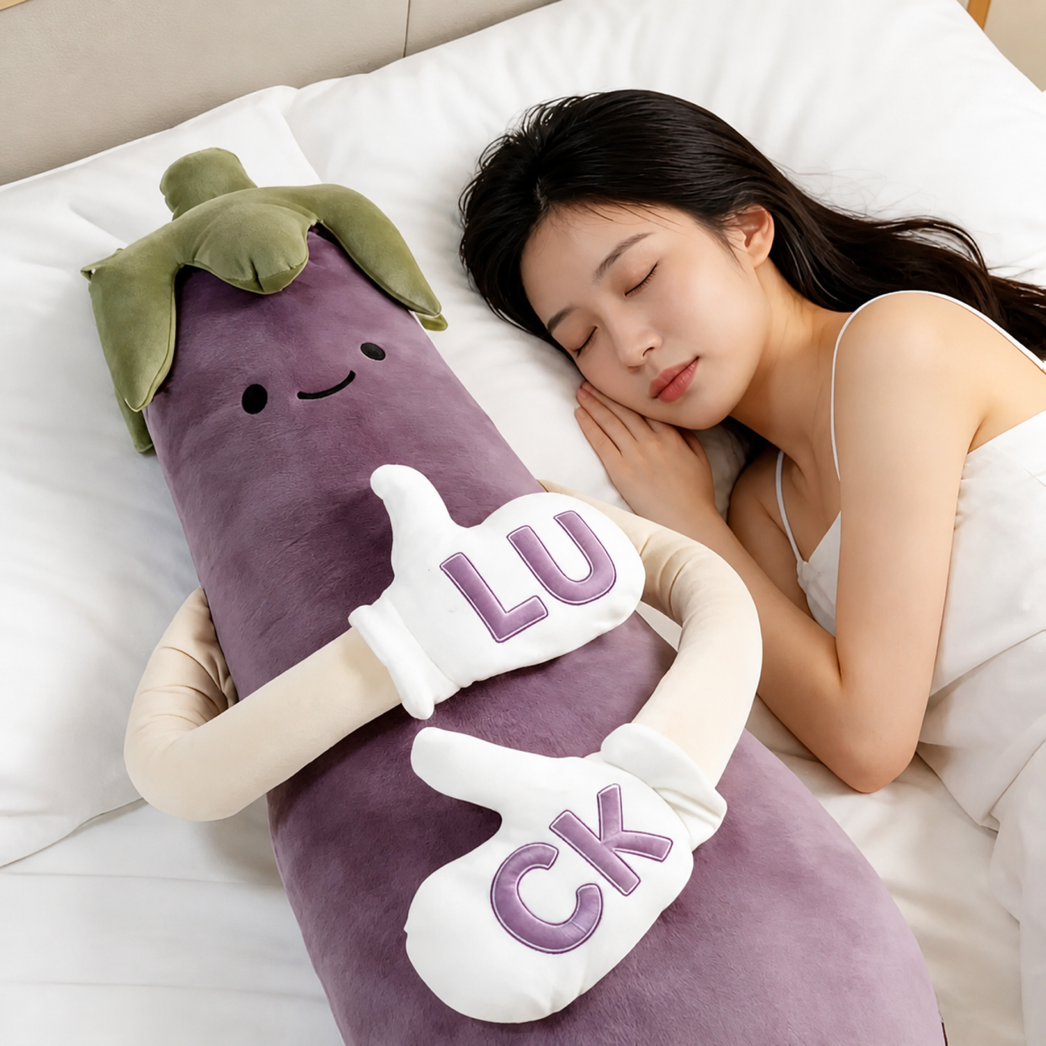 Lucky Eggplant HugBeat plush beside a sleeping woman